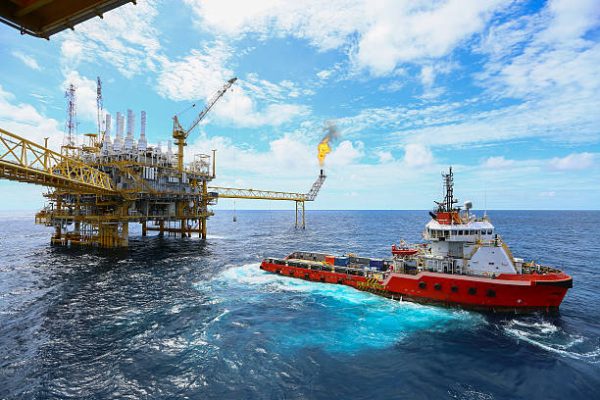 Offshore construction platform for production oil and gas, Oil and gas industry and hard work,Production platform and operation process by manual and auto function, oil and rig industry and operation.